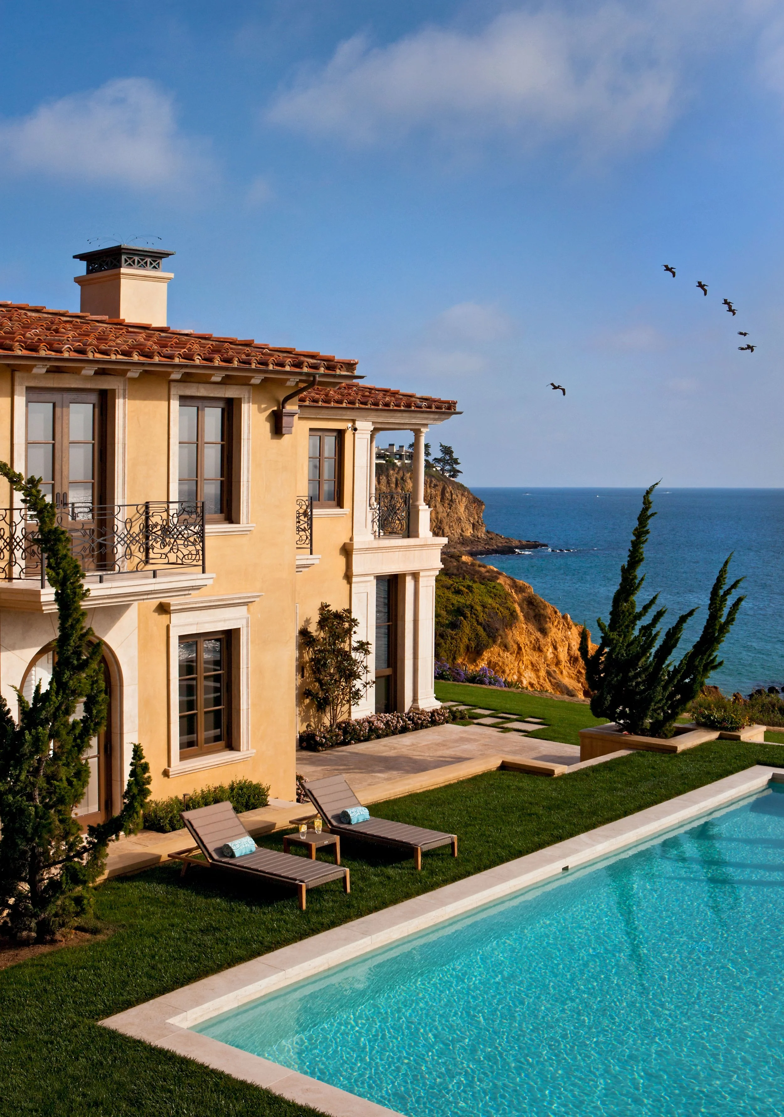 Luxury coastal home with swimming pool and ocean view