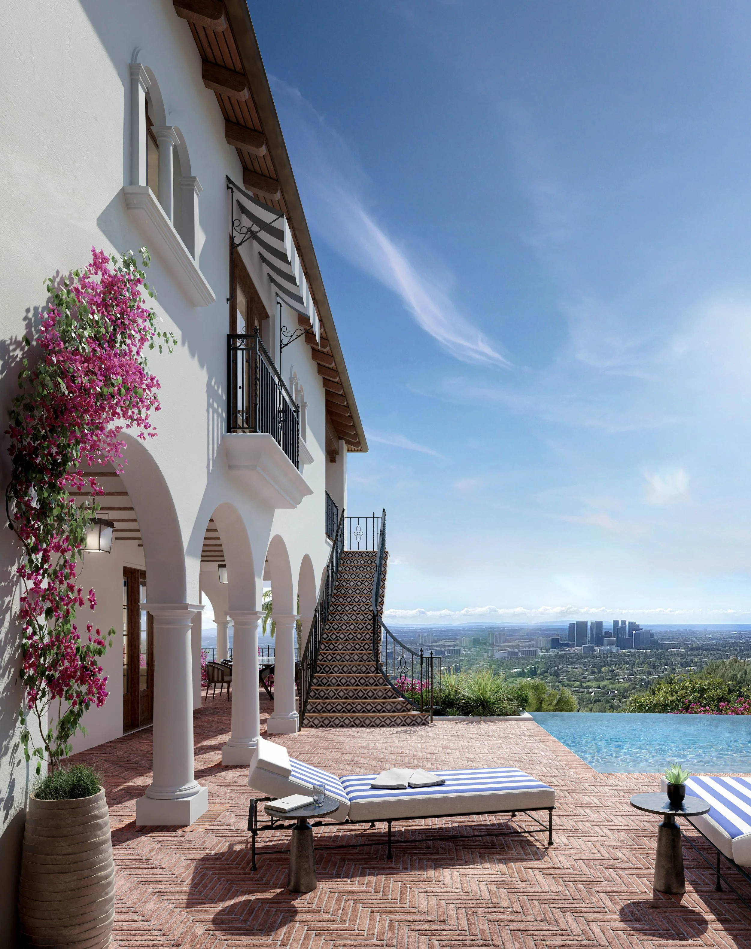 Outdoor patio with pool, loungers, tiled stairway, arched facade, and city skyline view.