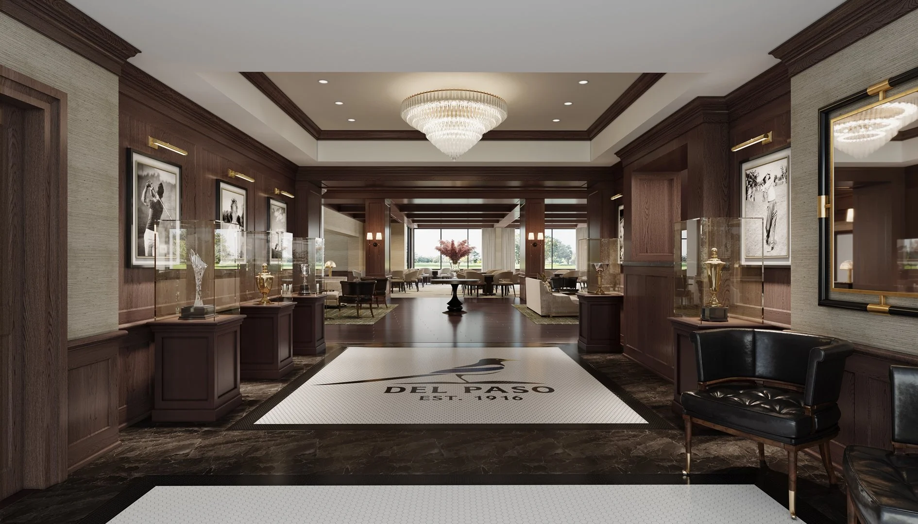 Elegant entrance hall at Del Toro Country Club featuring rich wood paneling, a grand chandelier, golf memorabilia displays, and a seating area, designed by The Warner Group Architects.