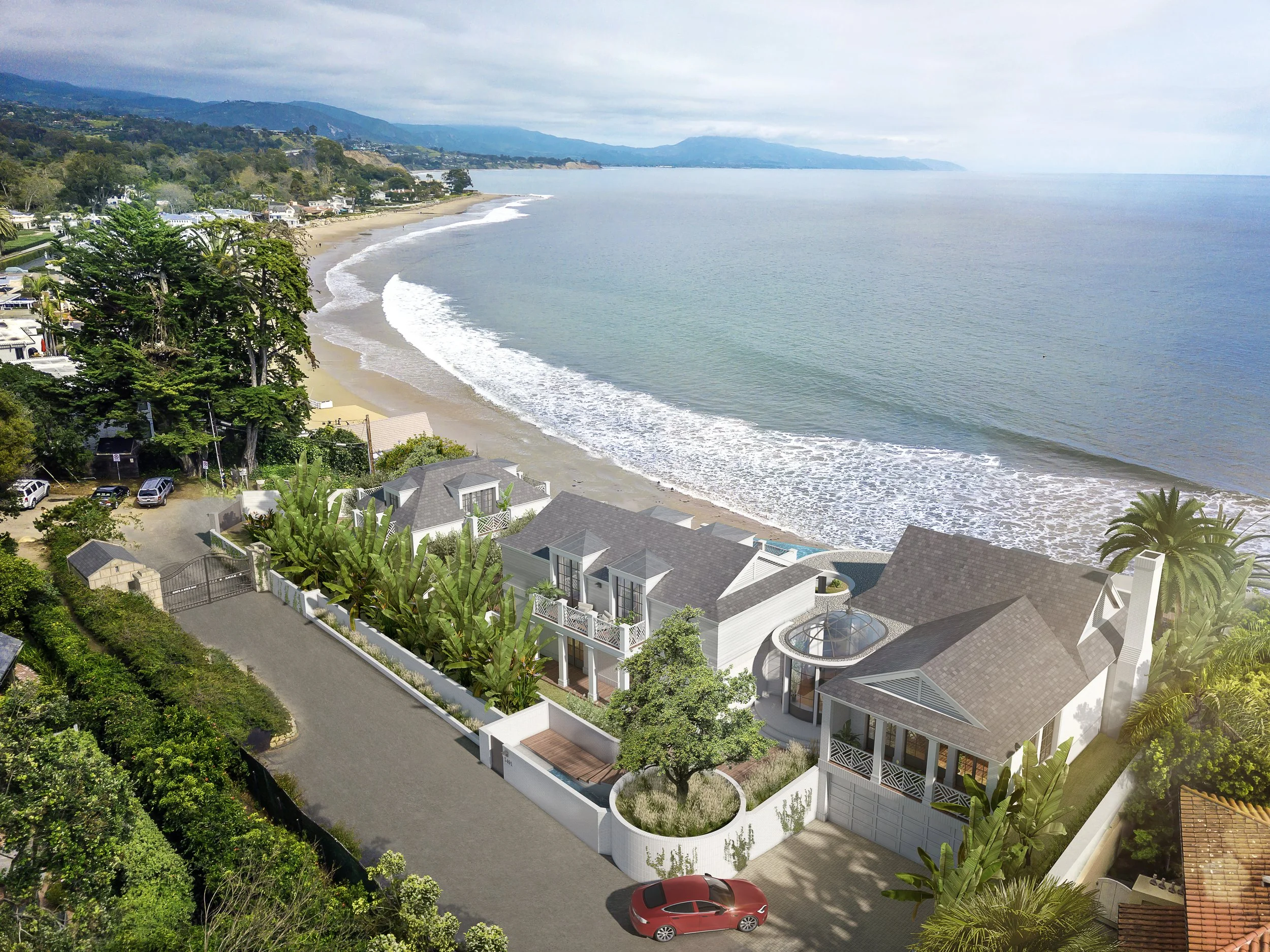 Coastal luxury homes near a sandy beach with ocean view and lush greenery.