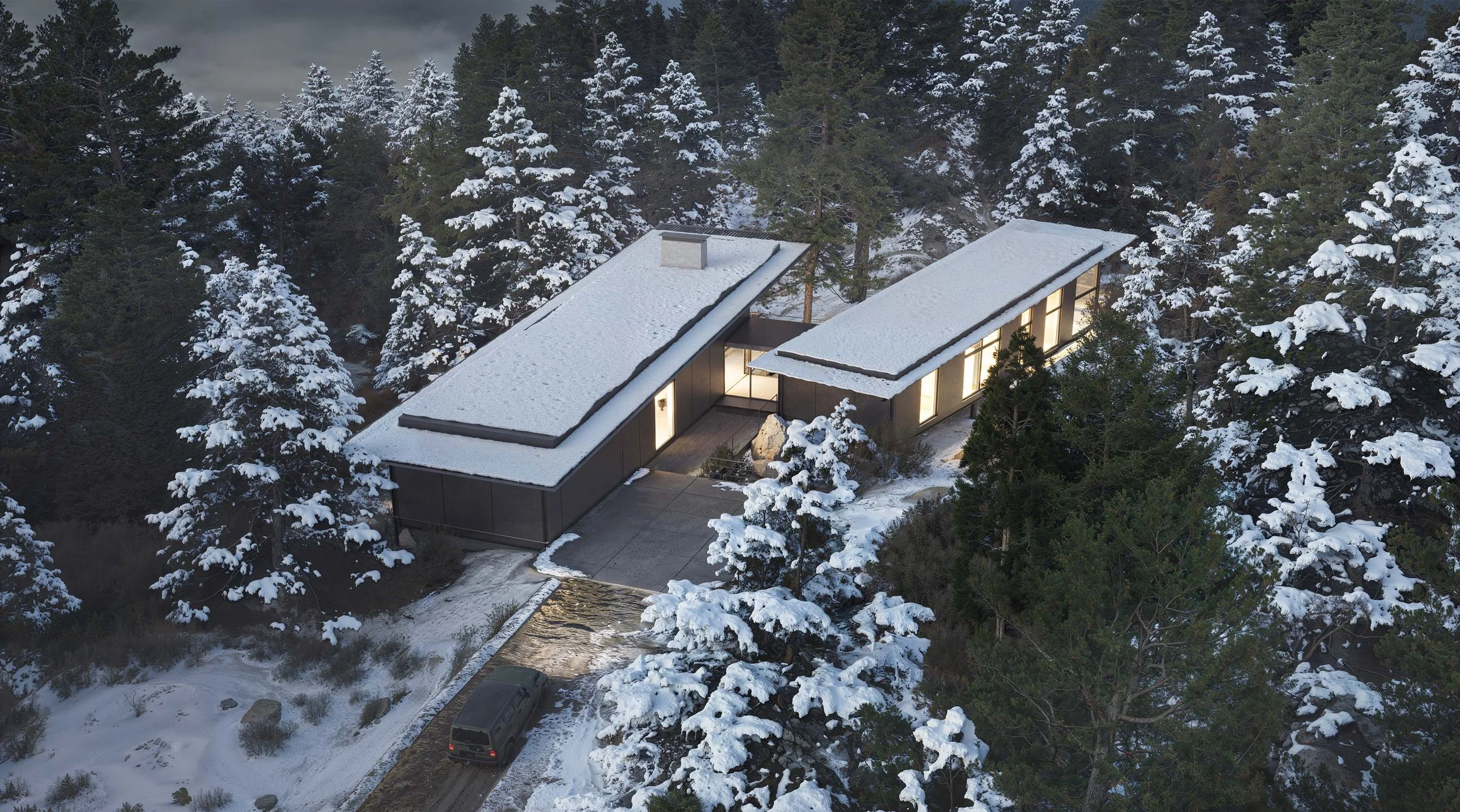 Mountain retreat with exposed concrete fireplace